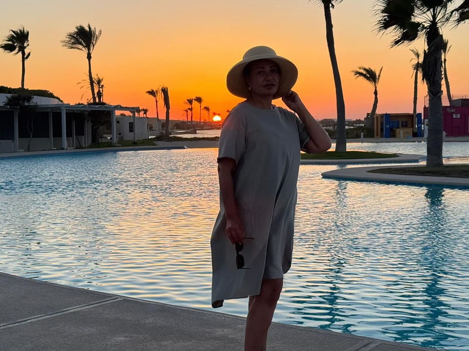 May be an image of 1 person, hat and pool