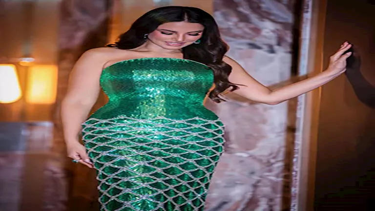 درة تخطف الأضواء بإطلالة مستوحاة من حراشف السمك